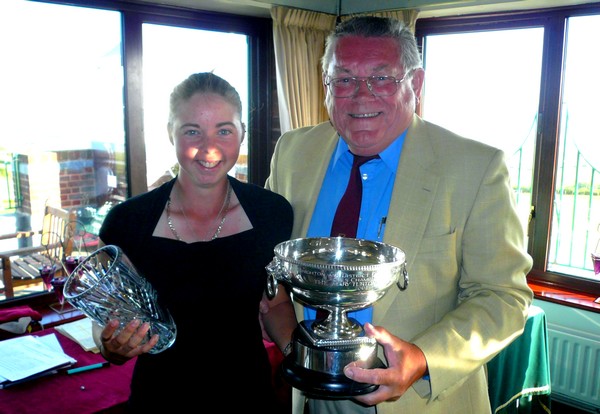 Roy Bowerman, President of the B&DGS, presenting Stacey Rodger, the B&DGS Ladies Champion, with the Mary Turton Trophy and a commemorative vase